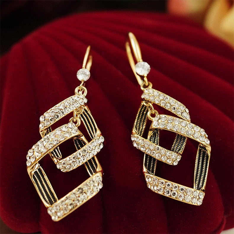 Stella Virelle Layered Gold Earrings
