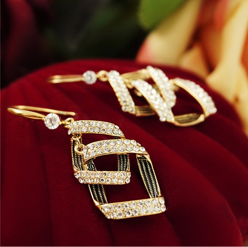 Stella Virelle Layered Gold Earrings