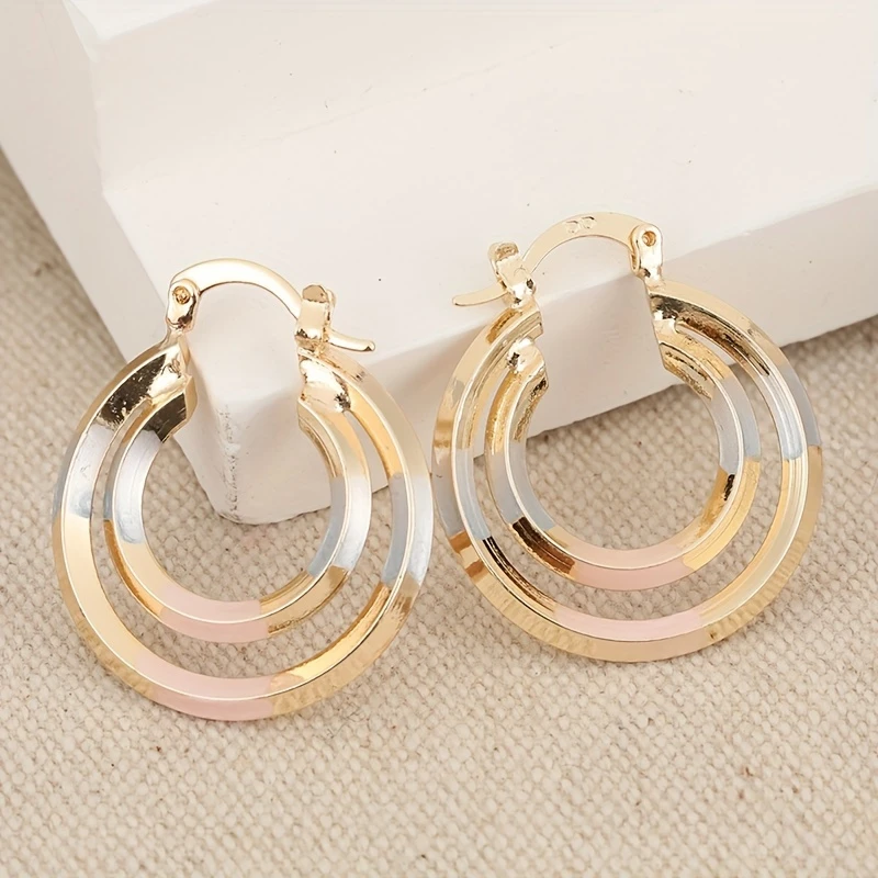 Circular Radiant Gold Earrings