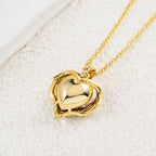 Angel Embrace Ruby Heart Gold Necklace