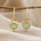 Emerald Gleam Gold Earrings